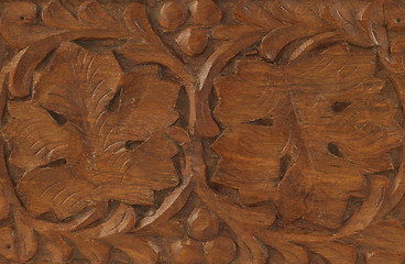 Image showing Leaves engraved on wood