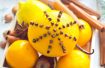 Image showing Fresh oranges and cinnamon for christmas