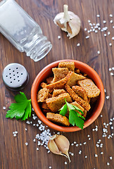 Image showing toasts with salt and garlic