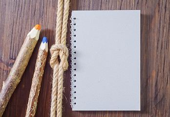 Image showing note and pencils