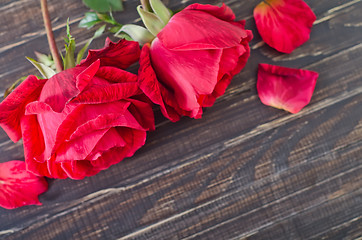 Image showing rose on wooden background