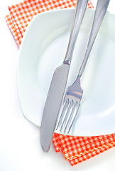 Image showing fork and knife on plate