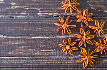 Image showing anise on wooden board