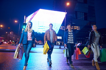 Image showing Group Of Friends Enjoying Shopping