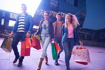 Image showing Group Of Friends Enjoying Shopping