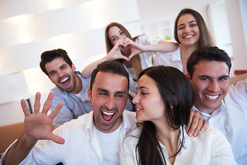 Image showing group of friends taking selfie