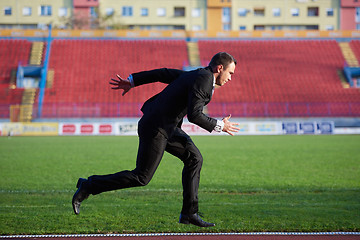 Image showing business man ready to sprint