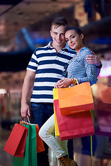 Image showing young couple with shipping bags