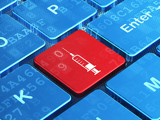 Image showing Health concept: Syringe on computer keyboard background