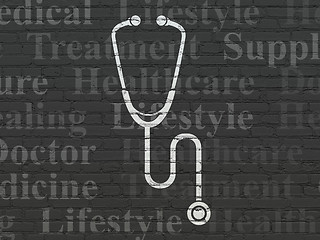Image showing Medicine concept: Stethoscope on wall background