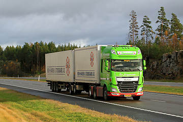 Image showing Lime Green DAF XF Full Trailer Truck on Motorway