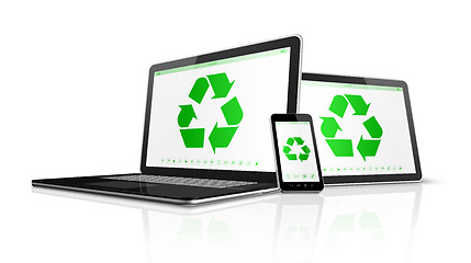 Image showing Electronic devices with a recycling symbol on screen. environmen