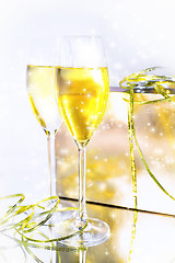 Image showing Two glasses of wine and a box on white background
