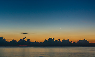 Image showing Cloudy dawn at sea