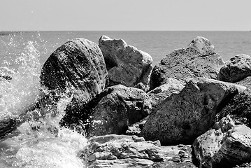 Image showing Wave on a cliff