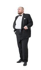 Image showing Jolly Fat Man in Tuxedo and Bow tie Shows Emotions