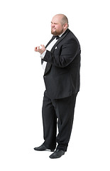 Image showing Jolly Fat Man in Tuxedo and Bow tie Shows Emotions