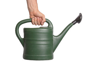 Image showing Hand holding green watering can