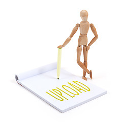 Image showing Wooden mannequin writing - Upload