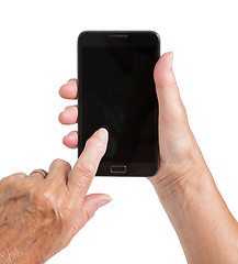 Image showing Senior woman hand with smart phone isolated