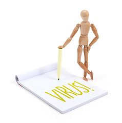 Image showing Wooden mannequin writing - Virus