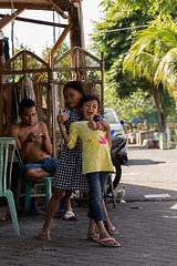 Image showing Indonesian girls with family in Manado shantytown