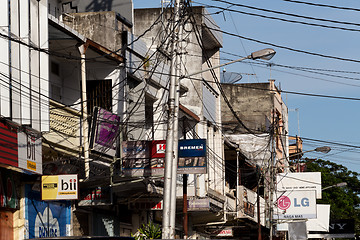 Image showing Billboards and communications cables on Manado street