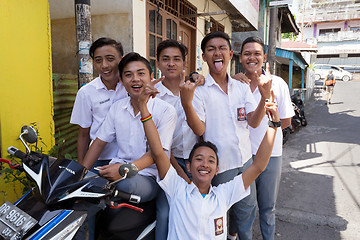 Image showing young happy muslim students in white uniform