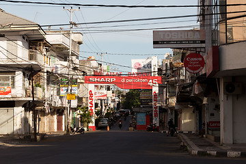 Image showing Billboards and communications cables on Manado street