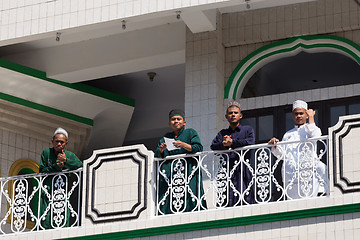 Image showing young happy muslim teenagers in mosque