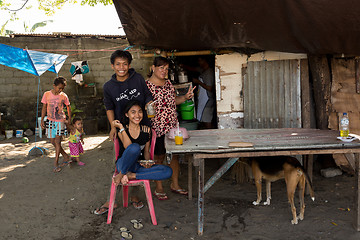 Image showing Indonesian family in Manado shantytown