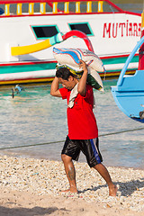 Image showing Men transports cargo from ship