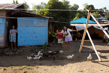 Image showing Happy indonesian womans in Manado shantytown