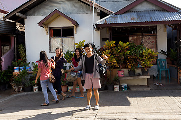 Image showing Indonesian teenagers in Manado shantytown