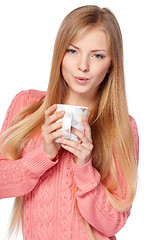 Image showing Woman holding a cup