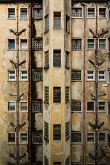 Image showing Facade of a  rundown old building 