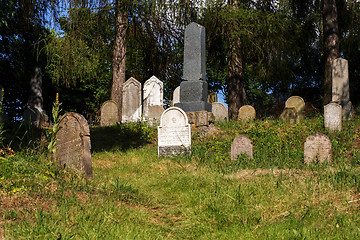 Image showing forgotten and unkempt Jewish cemetery with the strangers