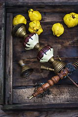 Image showing Still life with retro hookah and quince