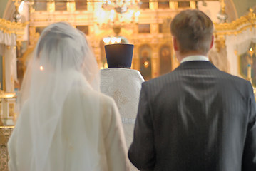 Image showing Young pair gets married in church