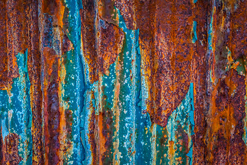 Image showing Rusty wall surface with blue paint