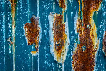 Image showing Rusty metal surface with blue paint