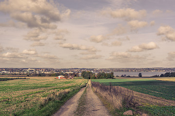 Image showing Long road in a countryside