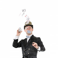 Image showing Illusionist Shows Tricks with Playing Card