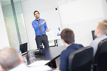 Image showing Business man making a presentation in office on job interview. 