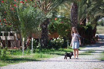 Image showing Girl with dog