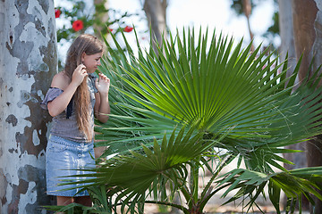 Image showing Girl and palm