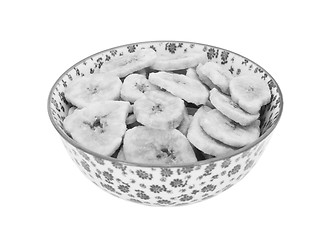 Image showing Dried banana chips in a china bowl