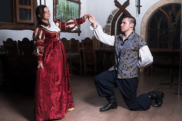 Image showing Attractive couple in retro dresses dance