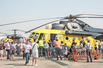 Image showing People explore the MI-10K helicopter