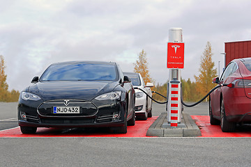 Image showing Tesla Model S Cars Plugged In at Supercharger Station